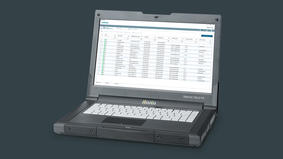 An opened laptop in the diagonal view shows the SINEC PNI user interface.